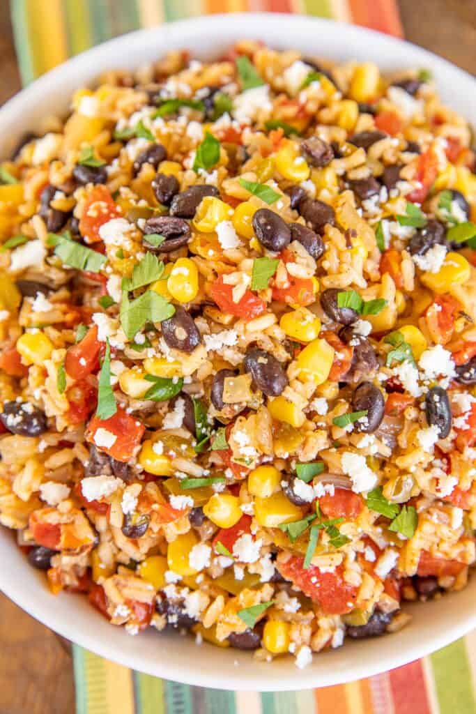 bowl of rice with black beans, peppers and corn