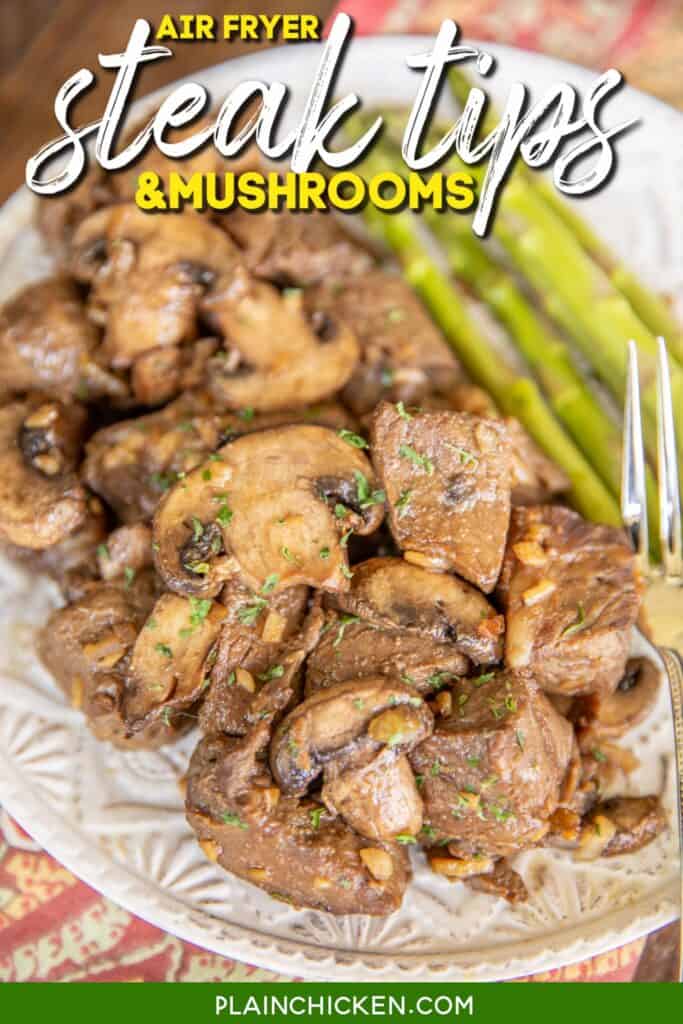 plate of steak mushrooms and asparagus