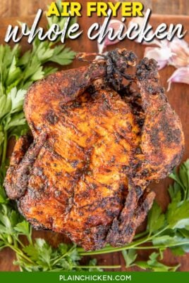 whole cooked chicken on cutting board