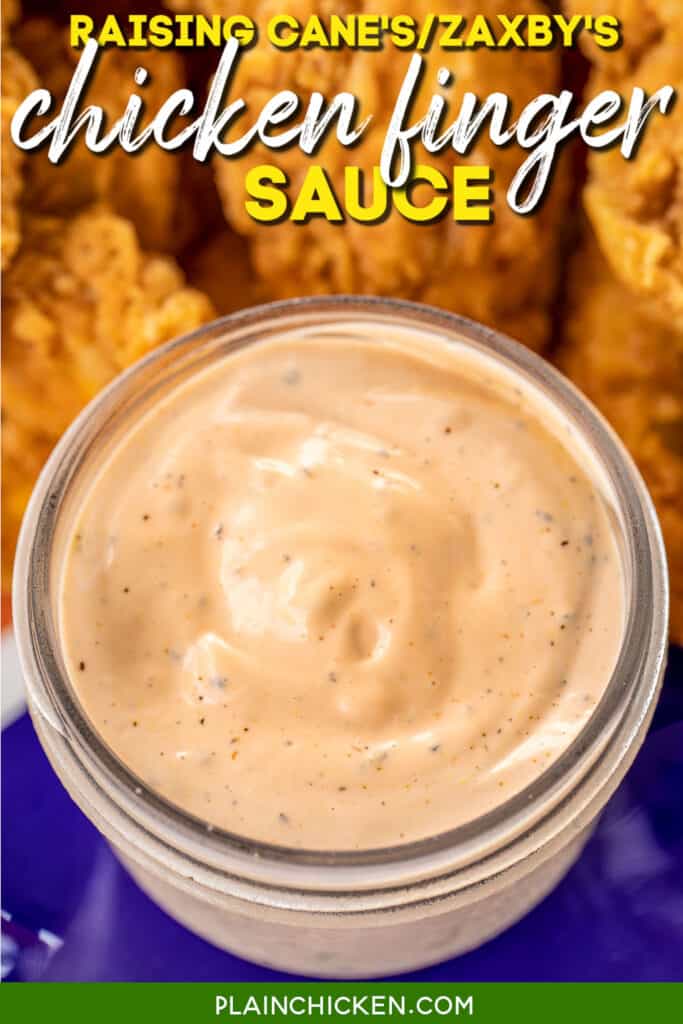 jar of chicken finger sauce with platter of chicken fingers