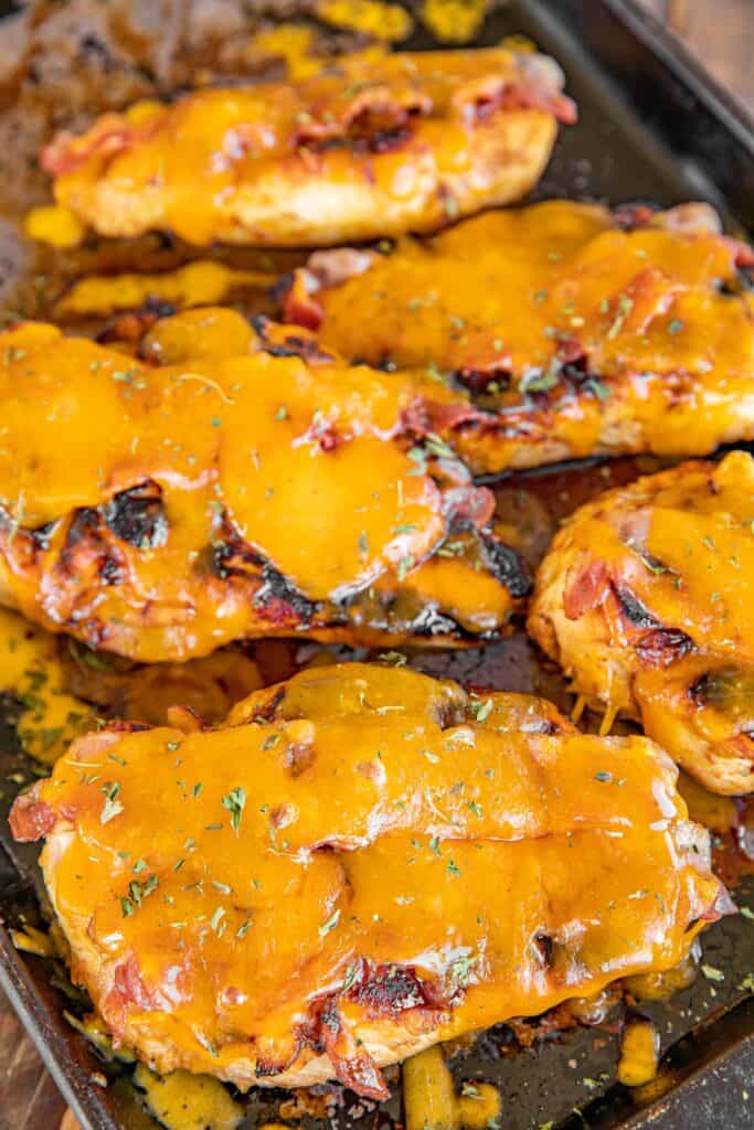 baking sheet with cheese and bacon chicken