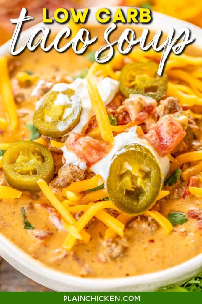 bowl of taco soup topped with sour cream and jalapenos