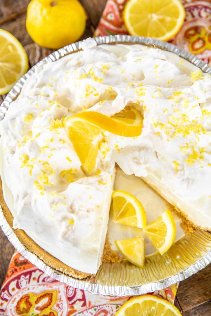 lemon pie with a slice cut out of it