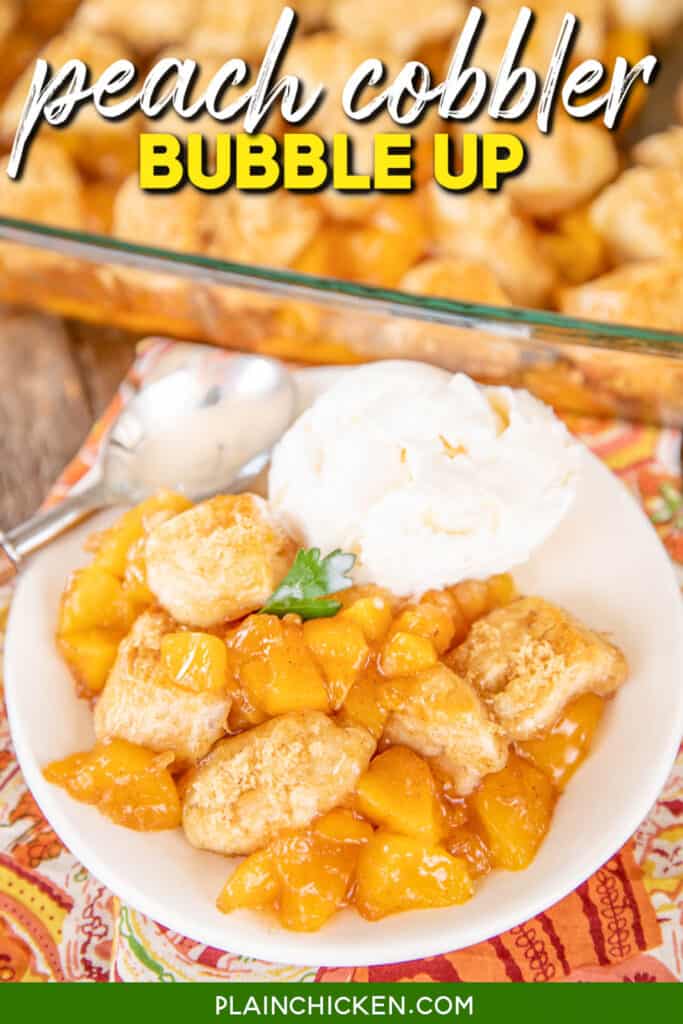 plate of biscuit peach cobbler bubble up with vanilla ice cream