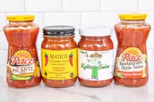 4 jars of salsa on the countertop