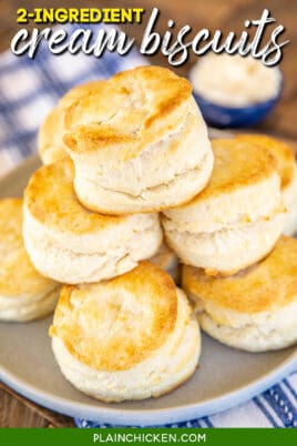 plate of cream biscuits stacked on top of each other