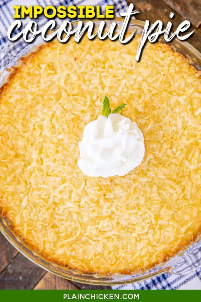 whole coconut pie topped with whipped cream on a table with text overlay