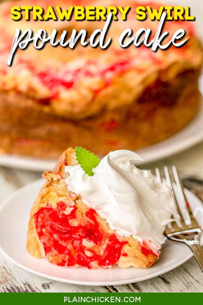 slice of strawberry cake on a plate topped with whipped cream