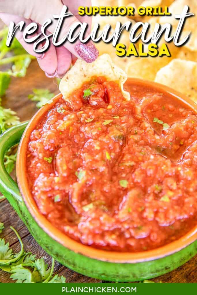dipping chip in superior grill salsa
