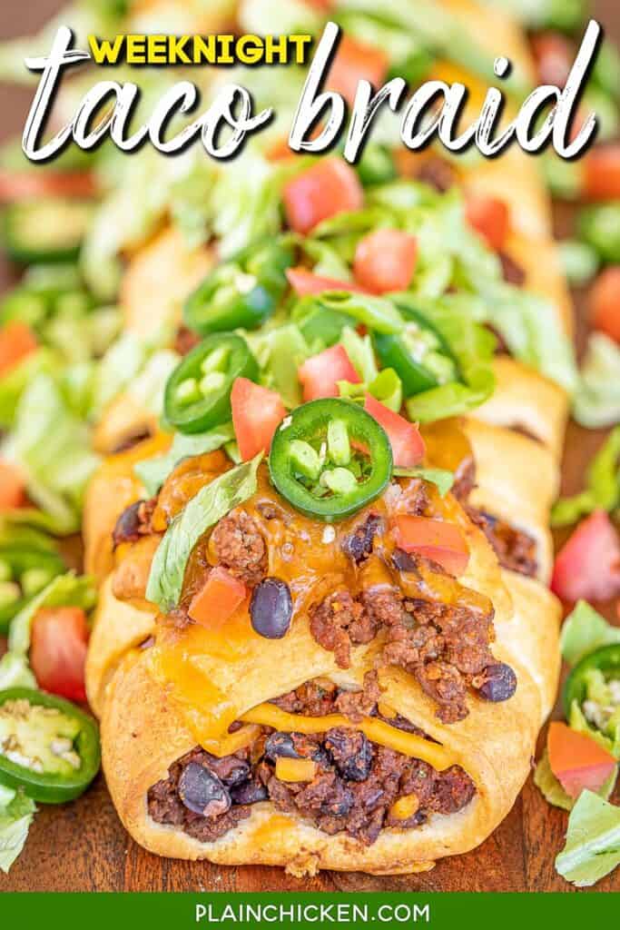 taco crescent roll braid topped with lettuce tomatoes and jalapenos with text overlay