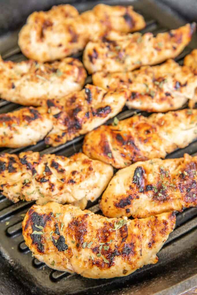 grilled chicken tenders in a grill pan
