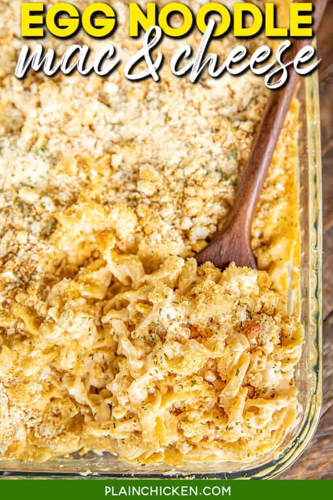 scooping mac & cheese from baking dish