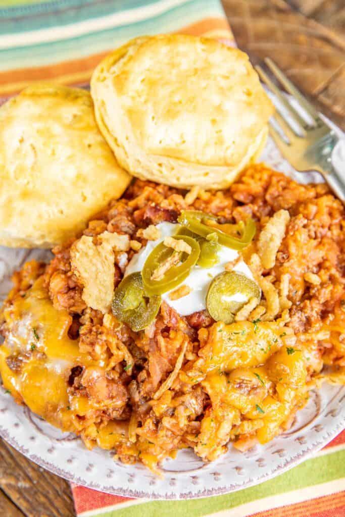 plate of chili hash brown casserole with biscuits