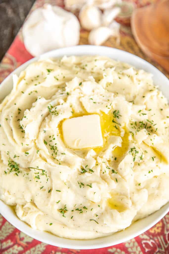 bowl of mashed potatoes topped with butter
