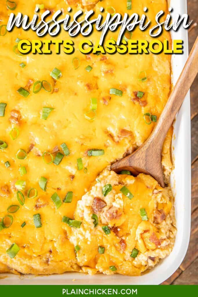 scooping ham and cheese grits casserole topped with green onions from a baking dish