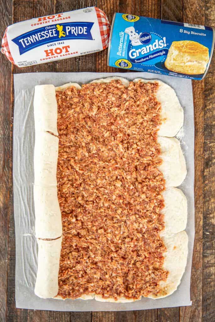 sausage on top of refrigerated biscuits