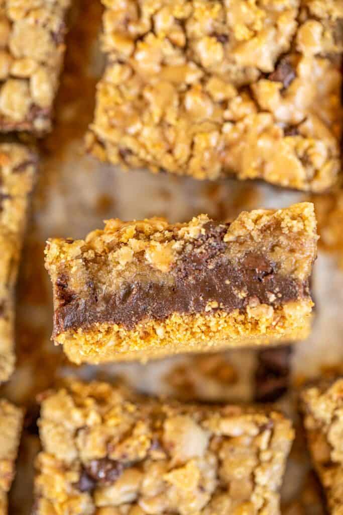 close up of layered cookie fudge bars