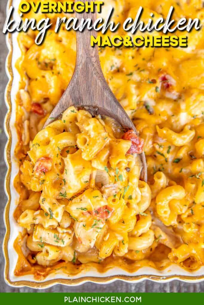 scooping cheesy chicken pasta from baking dish