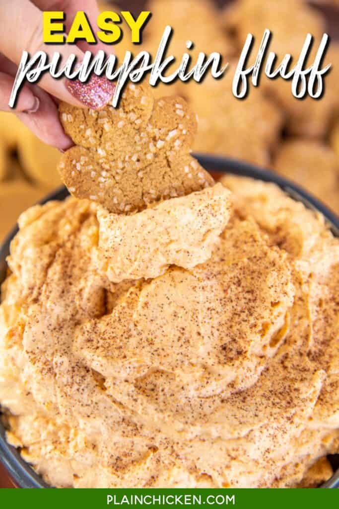 dipping a gingerbread man into a bowl of pumpkin cool whip dip