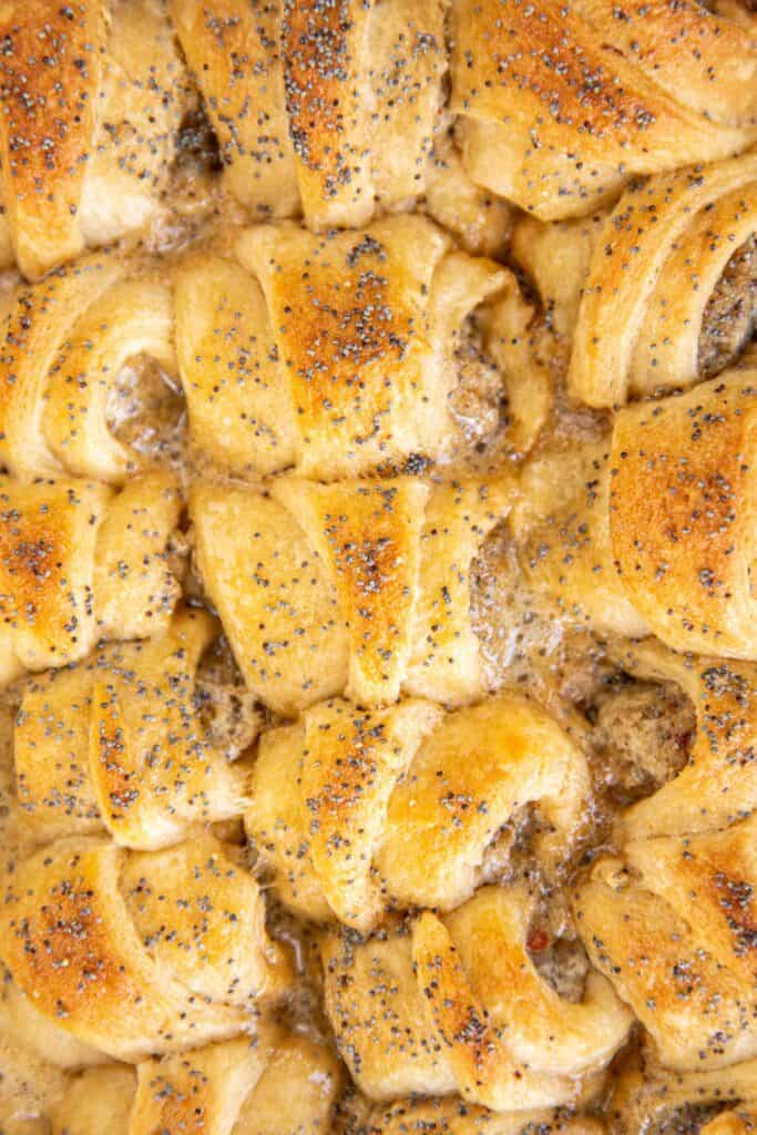 glazed sausage crescent rolls in a baking dish