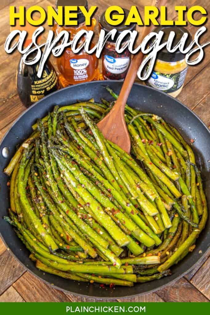 asparagus in a skillet with ingredients behind it