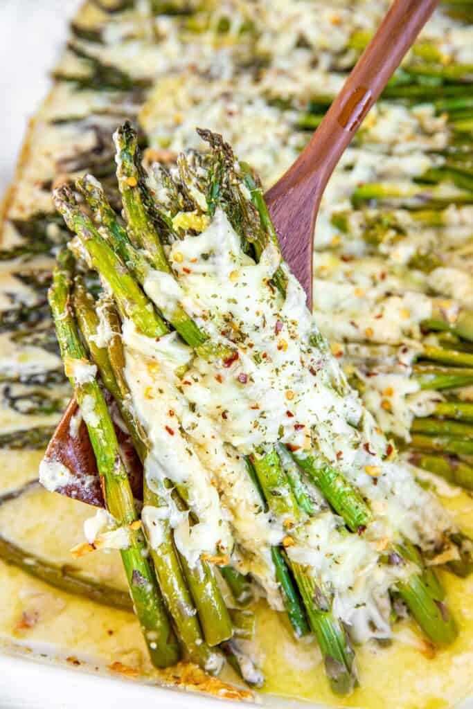 cheesy asparagus on a spatula