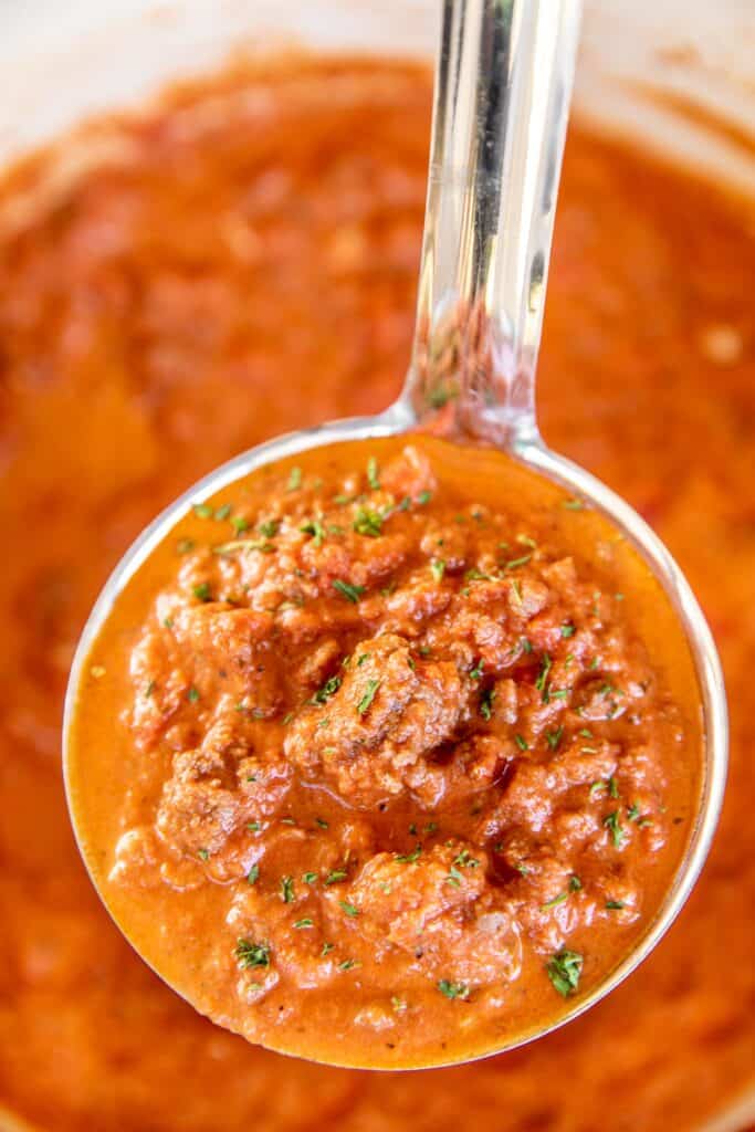 ladle of meat sauce