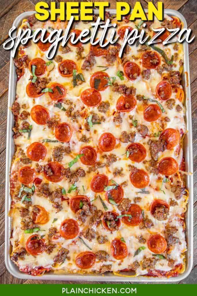 sheet pan of baked spaghetti topped with pepperoni with text overlay
