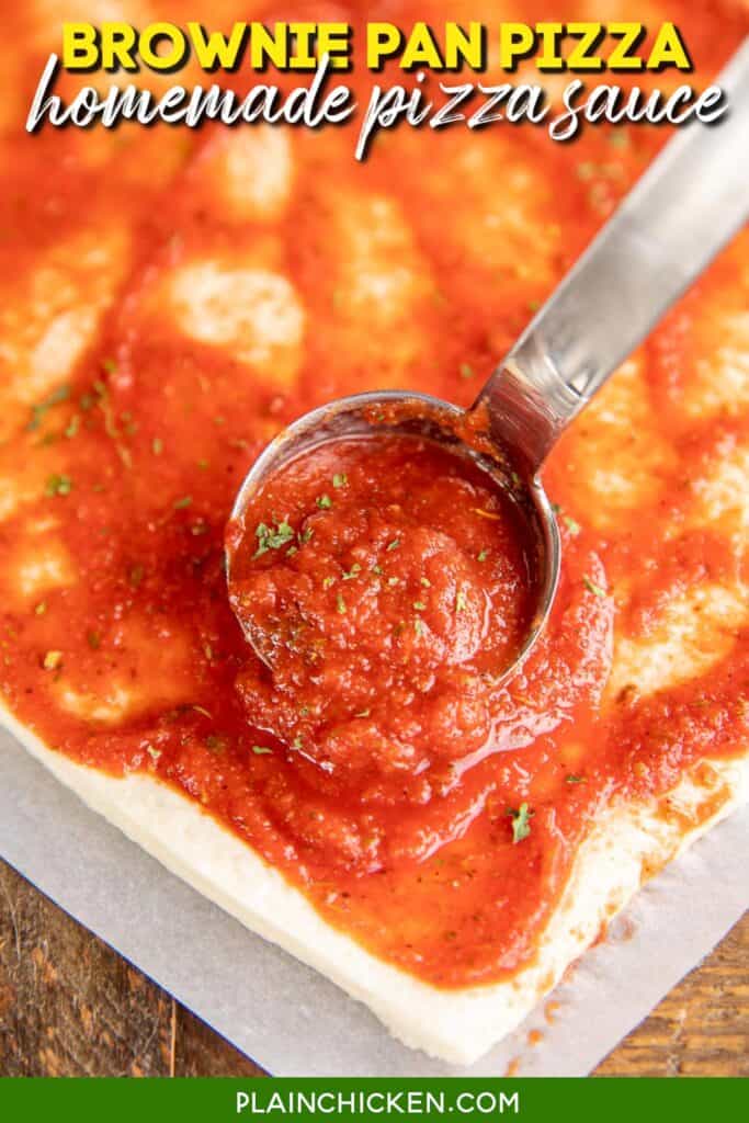 spooning homemade pizza sauce over pizza dough