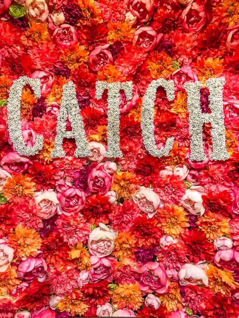 catch floral sign