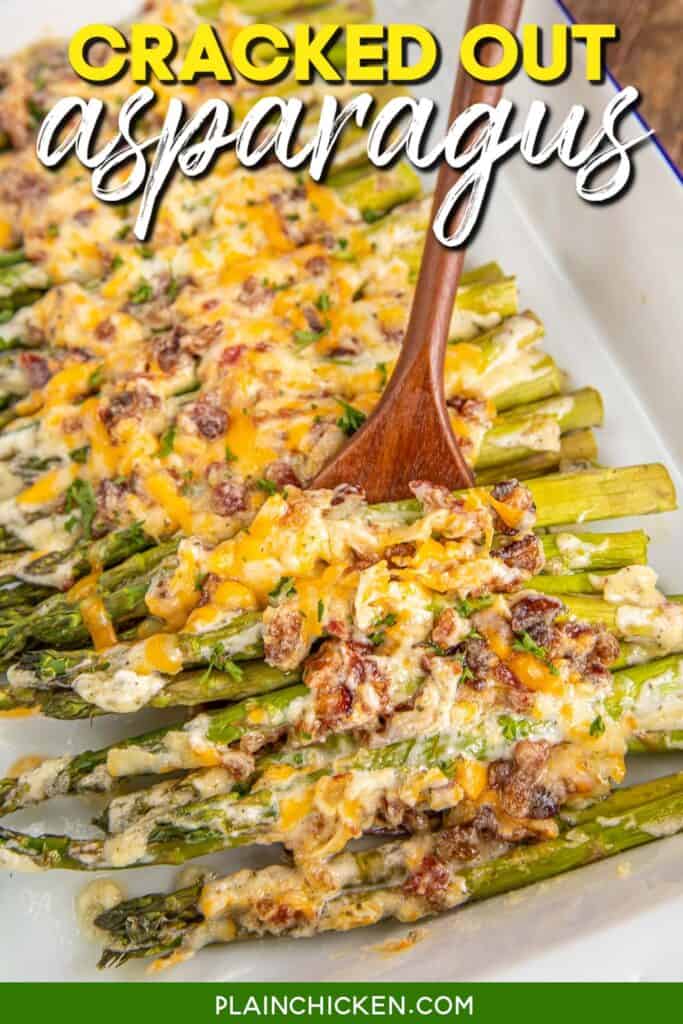 spooning cheese and bacon asparagus from baking dish with text overlay