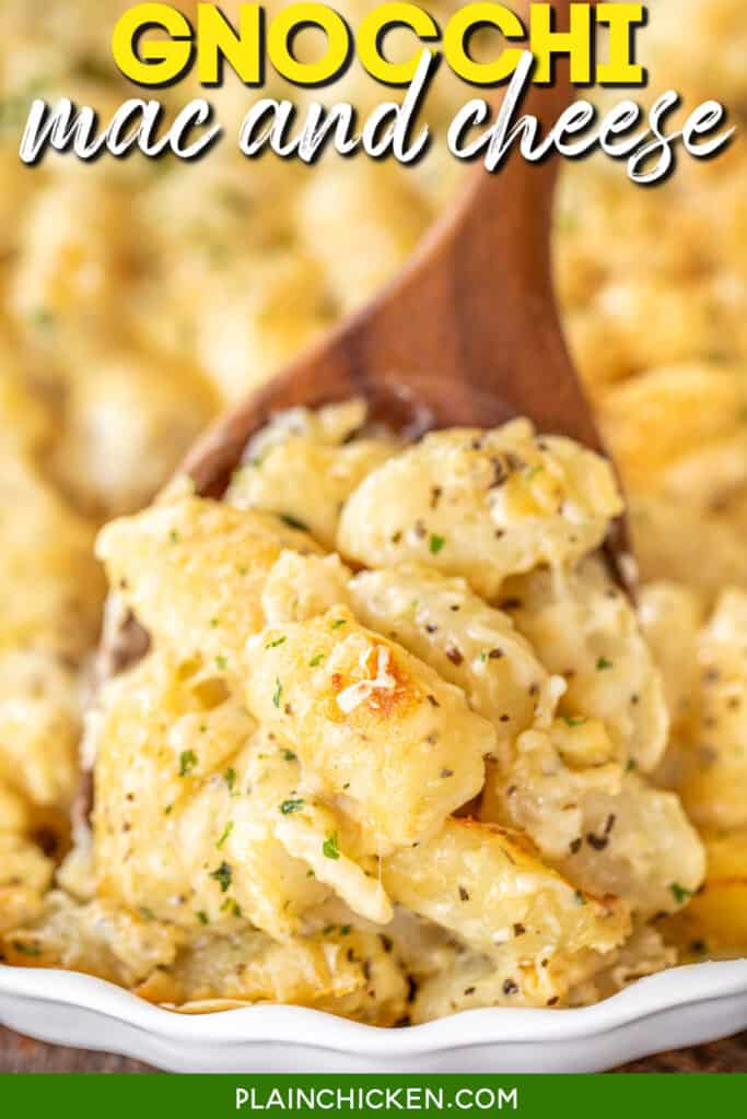 scooping gnocchi mac and cheese from baking dish