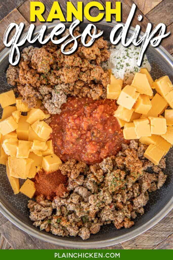 skillet of cheese dip ingredients with text overlay