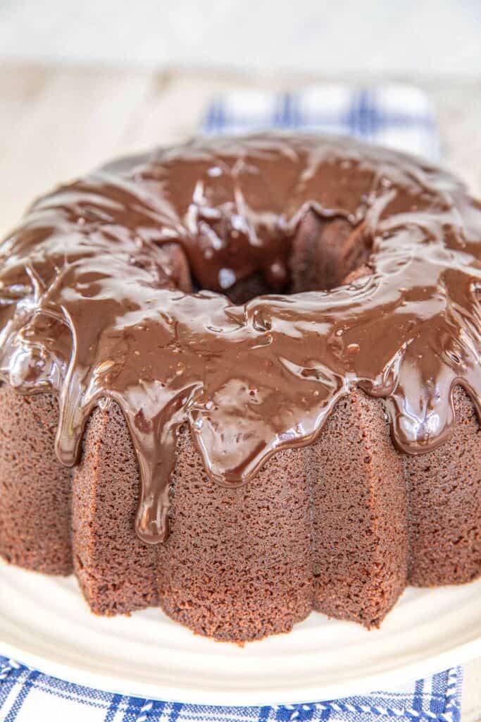 chocolate iced bundt cake on a platter