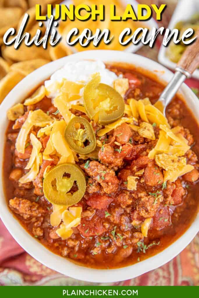 bowl of chili topped with cheese and jalapenos with text overlay