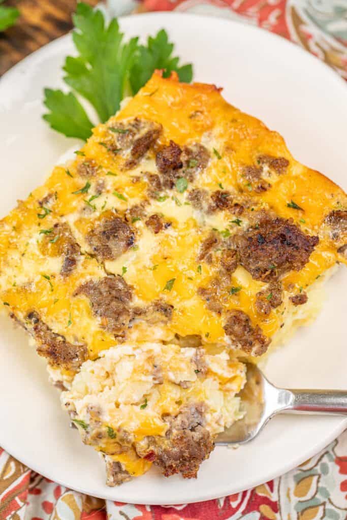 slice of sausage hash brown patty breakfast casserole on plate
