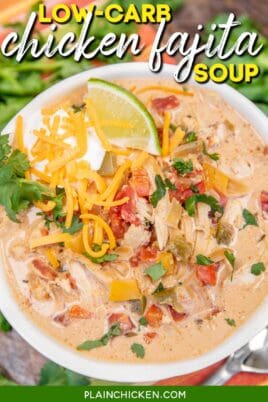 bowl of mexican chicken soup topped with cheese sour cream and lime with text overlay