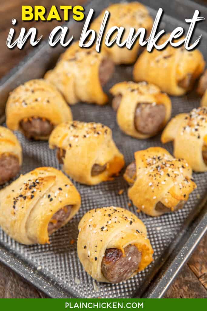 baking sheet of brats wrapped in crescent rolls with text overlay