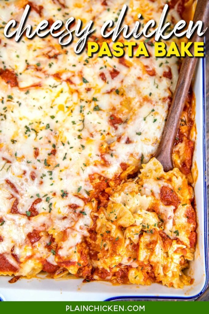 scooping cheesy chicken pasta from baking dish with text overlay