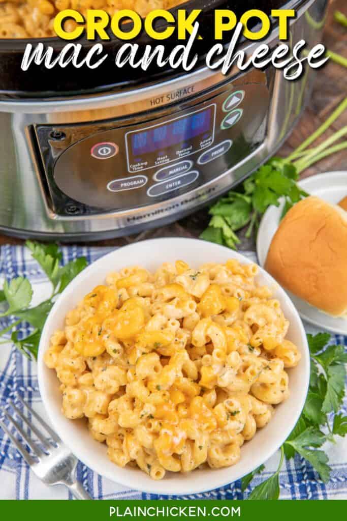 bowl of mac and cheese with a slow cooker in the background with text overlay