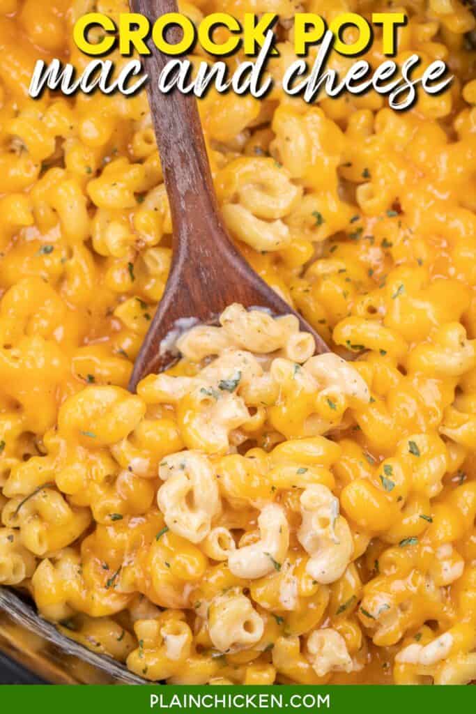 scooping macaroni and cheese from slow cooker with text overlay