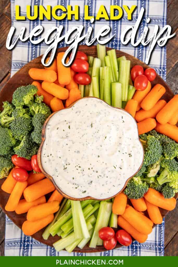 bowl of vegetable dip surrounded by fresh veggies with text overlay