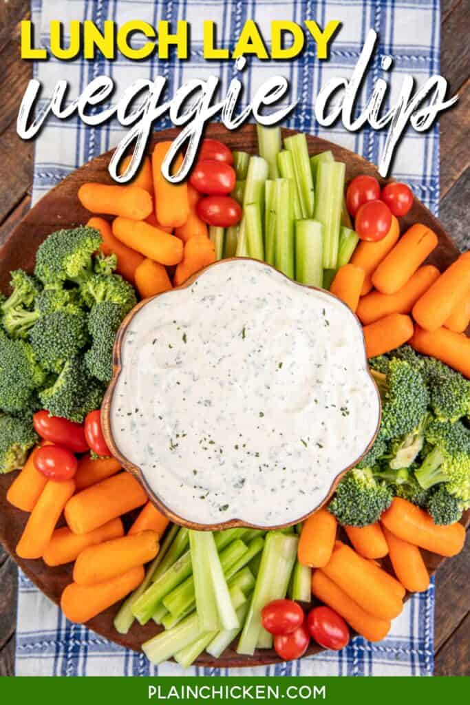 bowl of vegetable dip surrounded by fresh veggies with text overlay