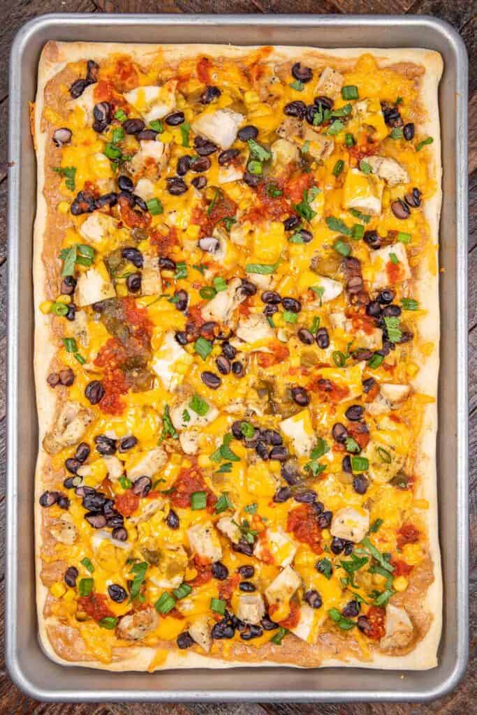 mexican chicken pizza in a rimmed baking sheet pan