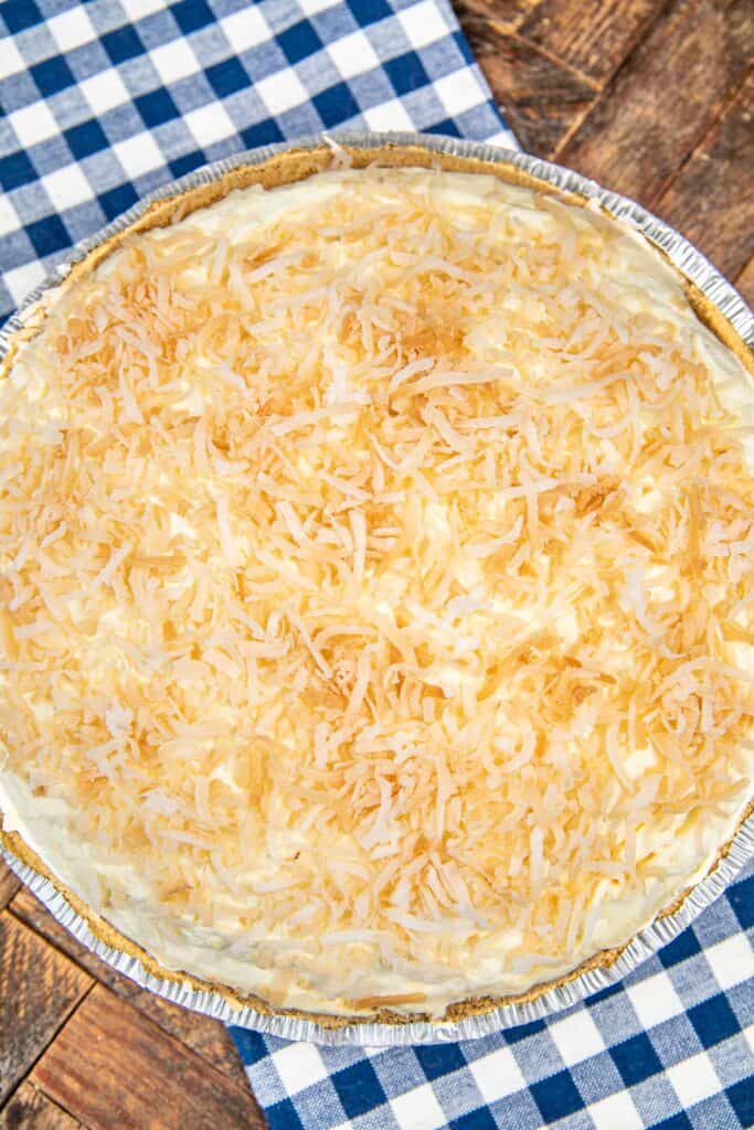 coconut pie on a blue checked tablecloth