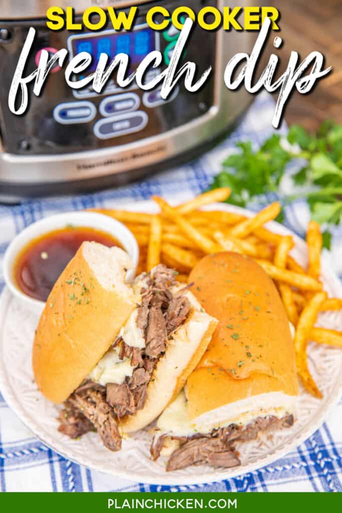 french dip sandwich on a plate with au jus and fries with text overlay