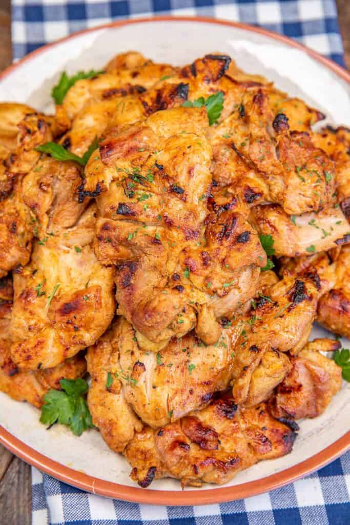plate of grilled chicken thighs