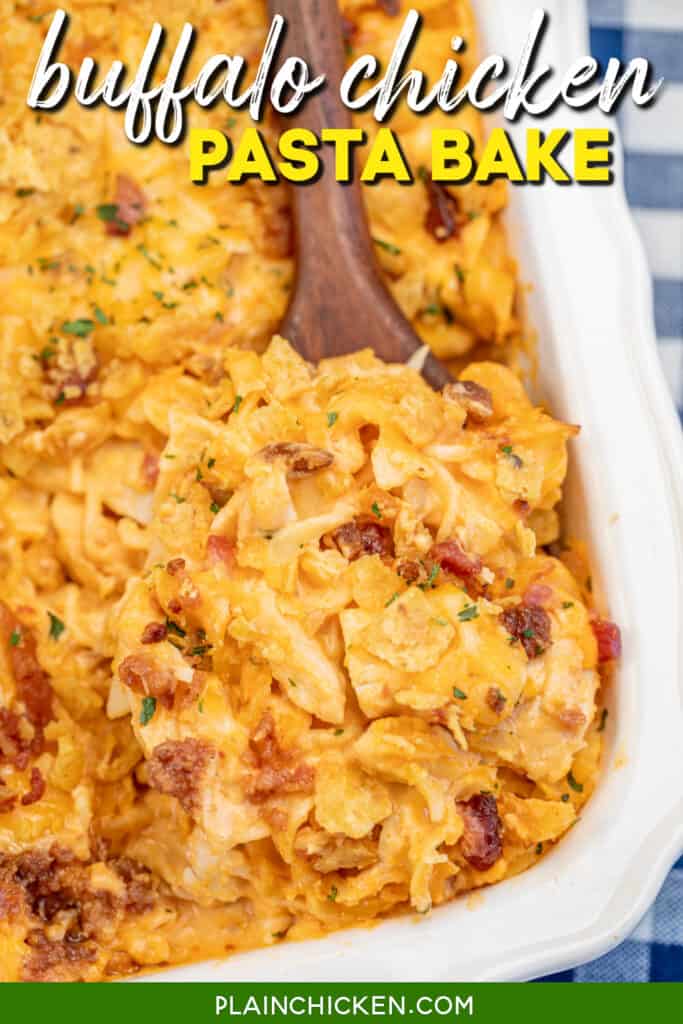 scooping buffalo chicken pasta from baking dish with text overlay