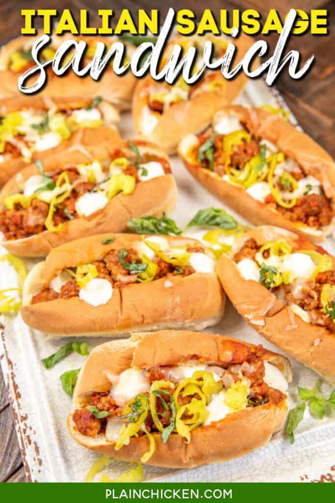 italian sausage sandwiches on a platter with text overlay