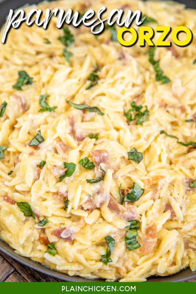skillet of creamy orzo with prosciutto and basil with text overlay